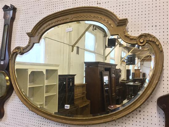 Gilt framed shaped